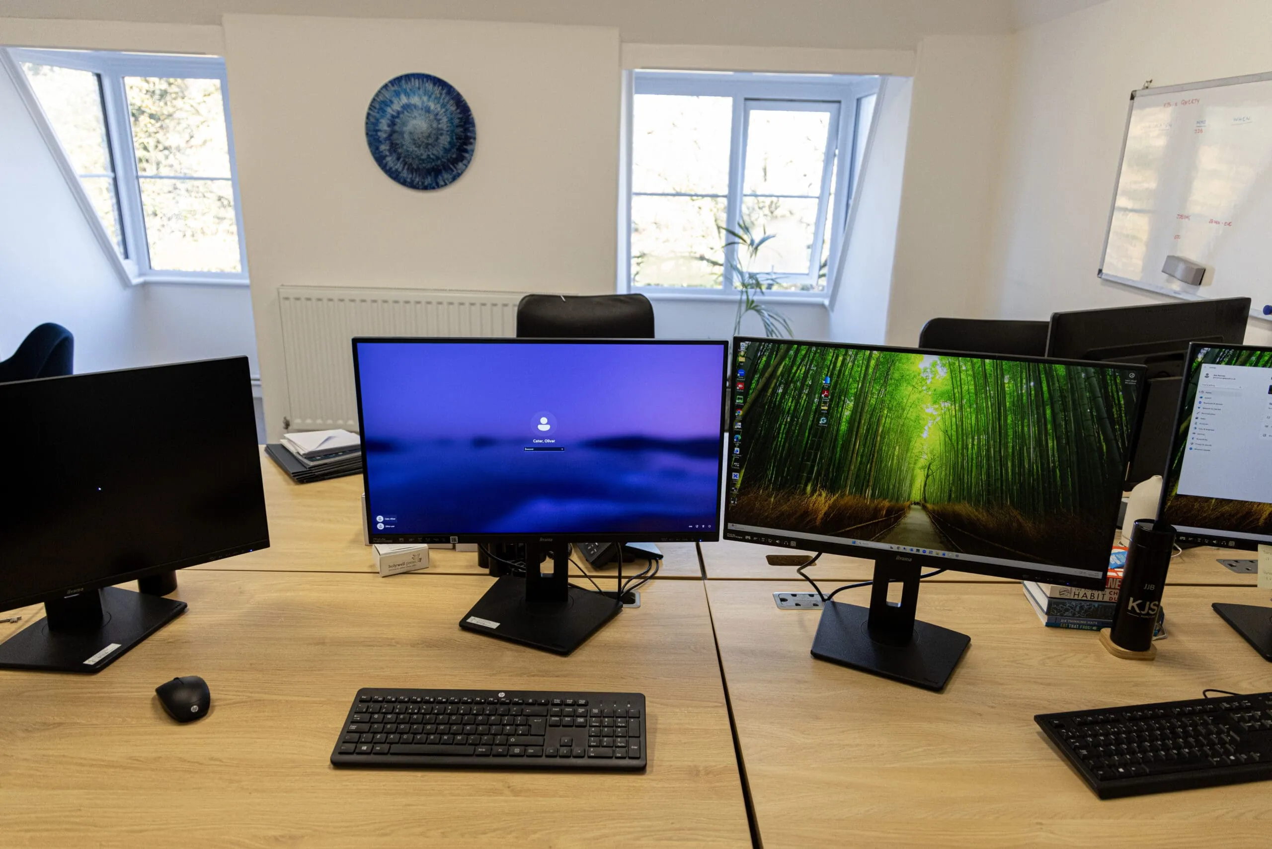 Desk with two monitors in a serviced office at Index House, set up and ready for a new tenant